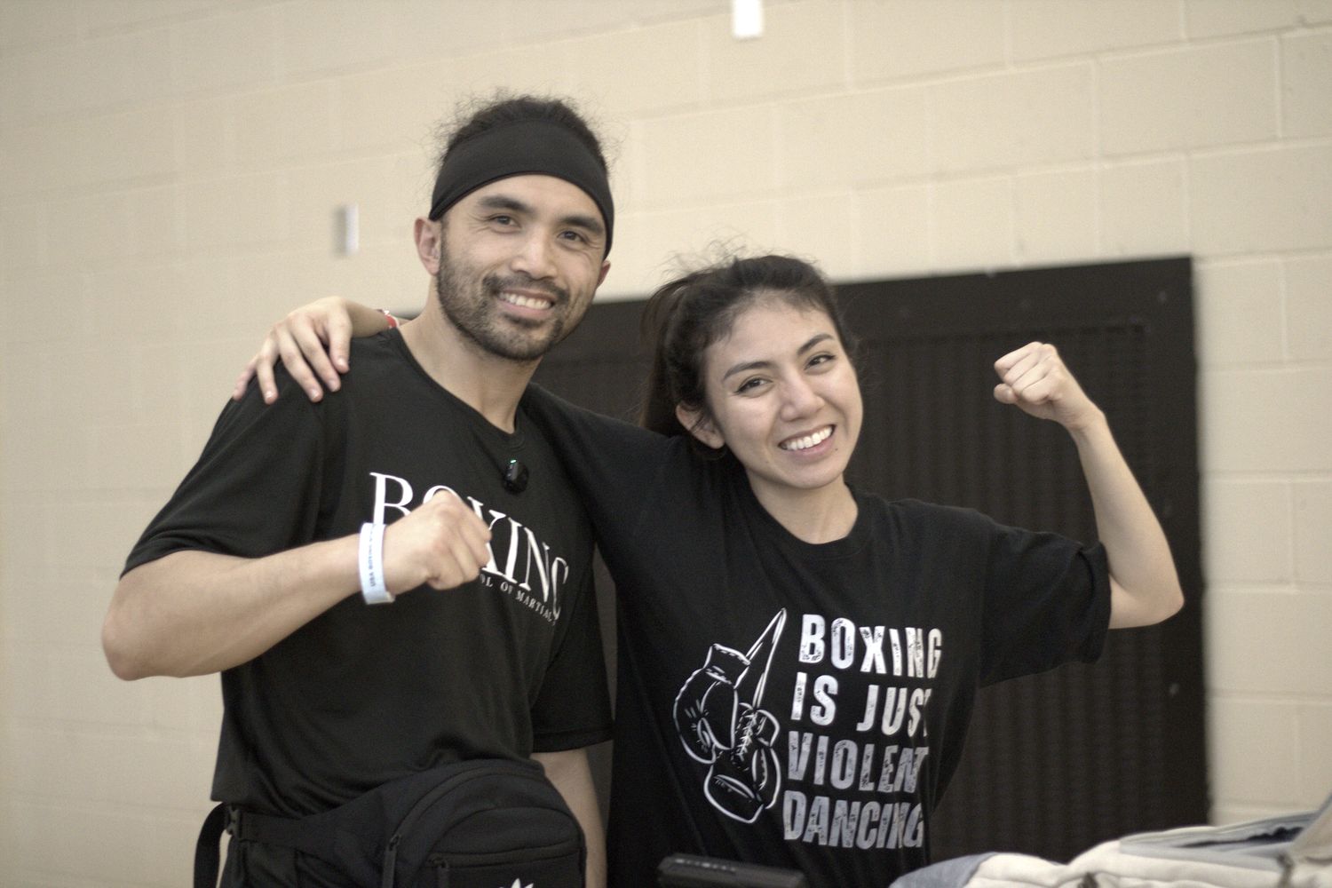 Coach Irwin and Coach Leia at a competition