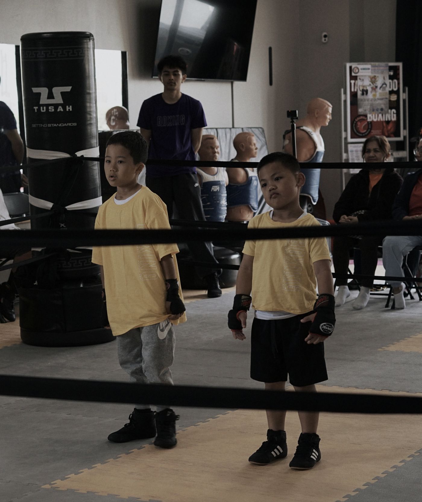 Young boxers waiting in the ring